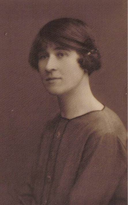 A couple of women posing for a picture
Description automatically generated